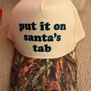 White and Camouflage Cap with Embroidered Text put it on Santa’s tab